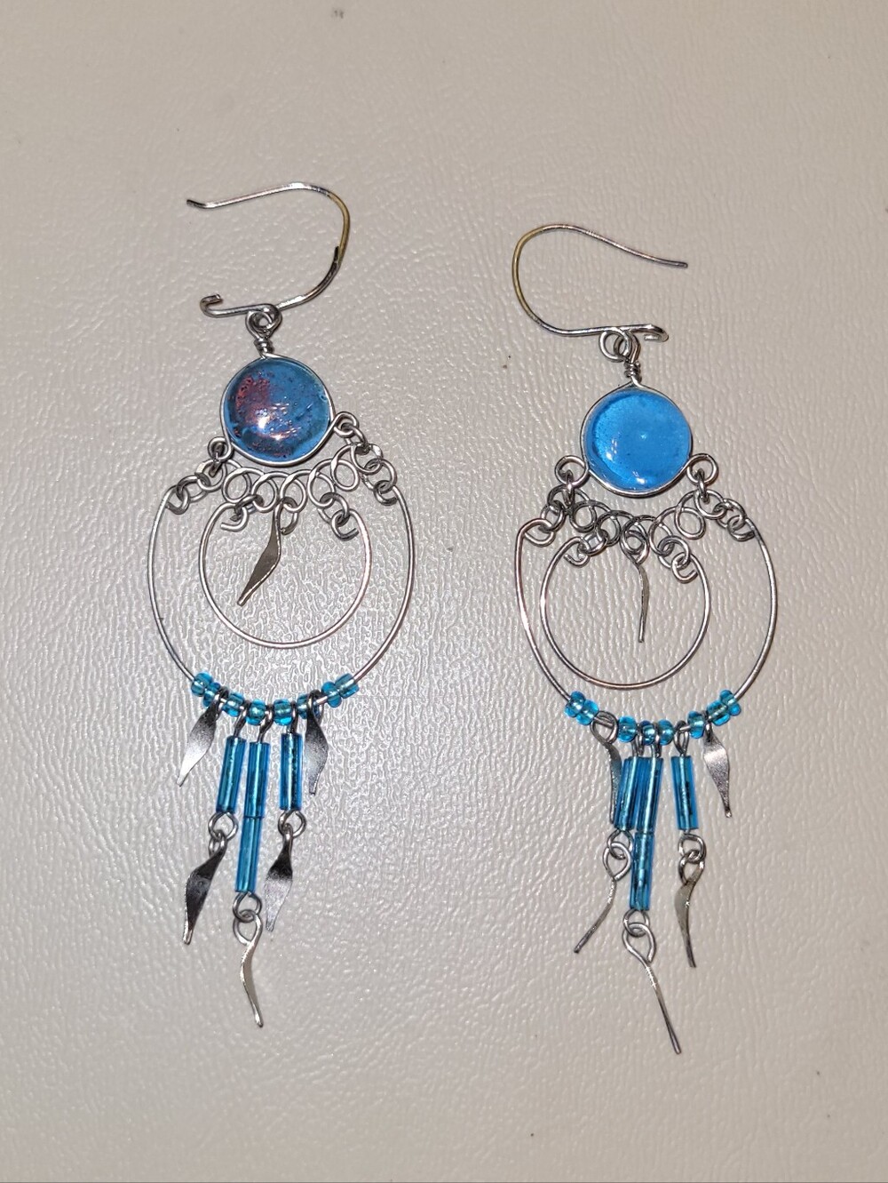 Handmade boho dreamcatcher-style dangle earrings.